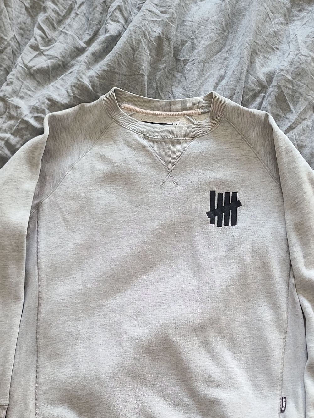 Undefeated Light Gray Crewneck Sweatshirt with Black Logo